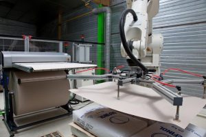 Palettenzwischenlagen: wie man sie erfolgreich in einen automatischen Palettierer integriert